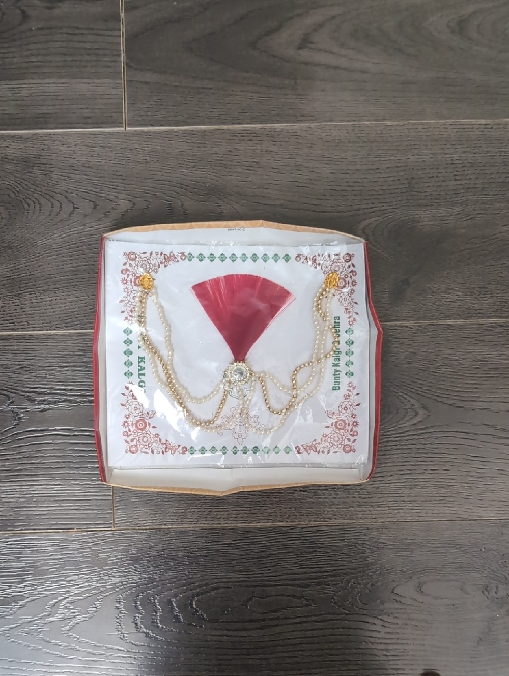Traditional Decorative Maang Tikka with Pearls and Red Fan Accent